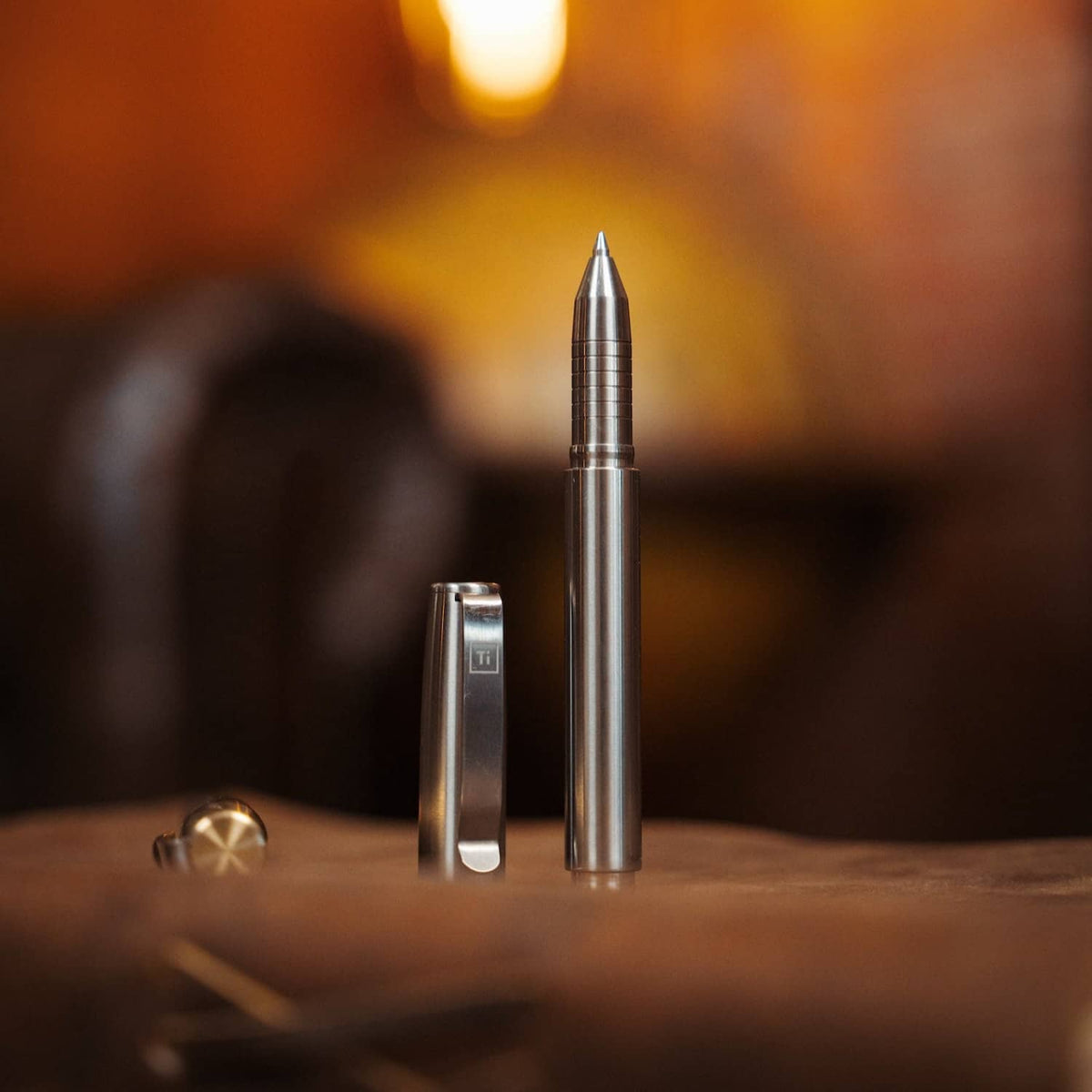 Sleek titanium capped pen from BIG IDEA DESIGN LLC with modern metal finish and precise ballpoint tip