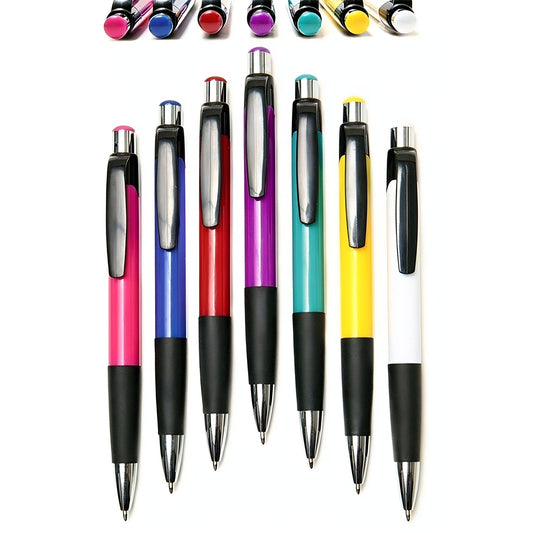 Seven Xpress Mardi Gras retractable pens by PensXpress, each with black grip and clip, stand vertically. Barrel colors include pink, blue, red, purple, green, yellow, and white. Additional pen tops are visible above.