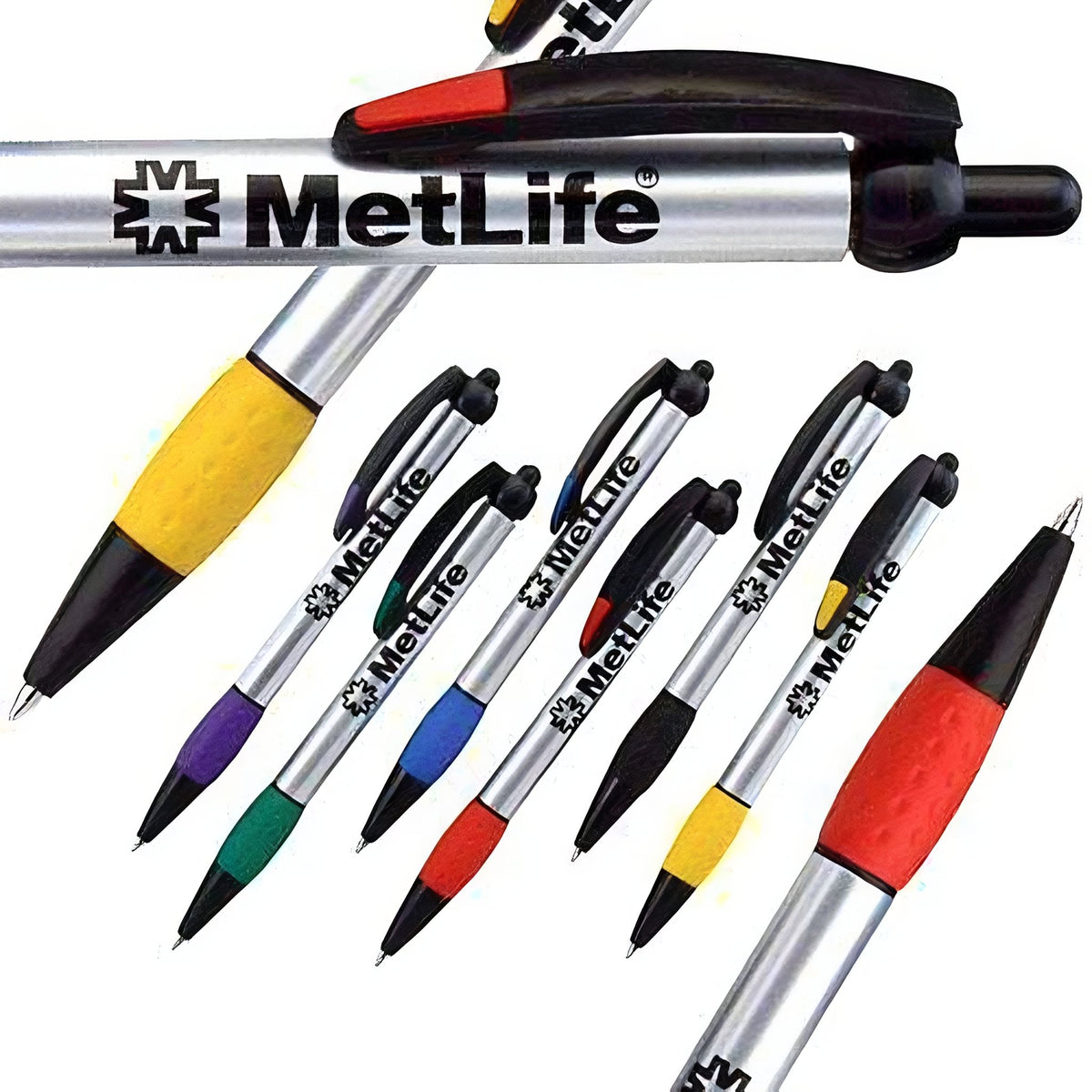 A set of six PensXpress Xpress Shadow pens with silver bodies, black clips, and assorted colored grips (yellow, red, green, blue, purple, orange), displayed in a fan shape.